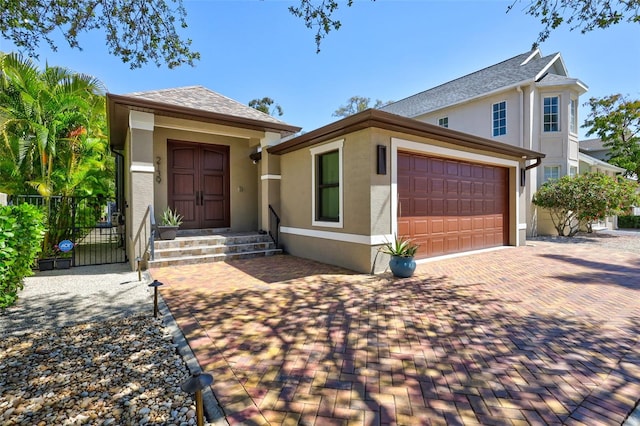 view of front of property with a garage