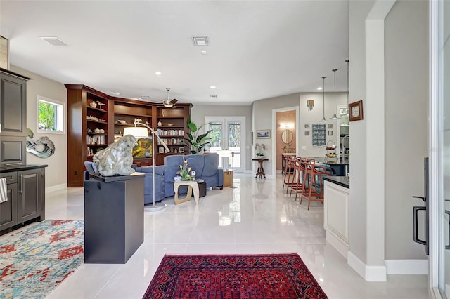 living room featuring light tile patterned flooring