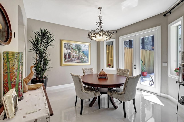 dining space featuring french doors