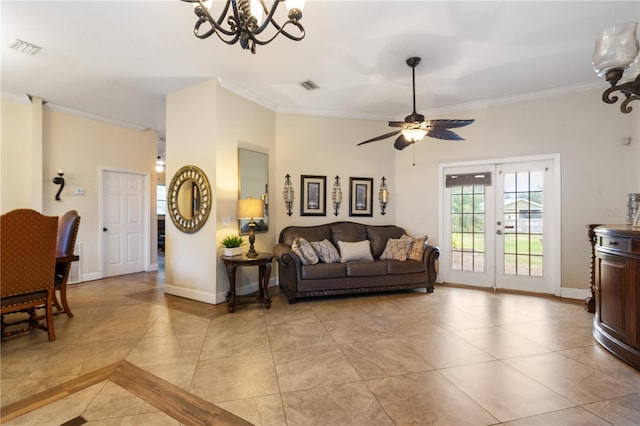 living room featuring ceiling fan with notable chandelier, light tile patterned flooring, ornamental molding, and french doors