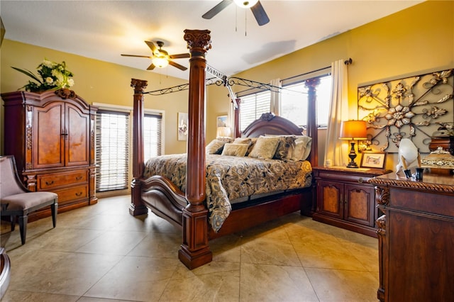 bedroom with multiple windows and ceiling fan