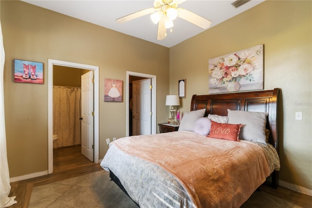 bedroom with connected bathroom and ceiling fan