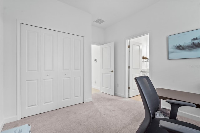 5107 Coral Reef Way, Bradenton, FL 34211 - home office with baseboards, visible vents, and light carpet