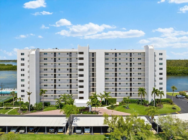 view of building exterior featuring a water view