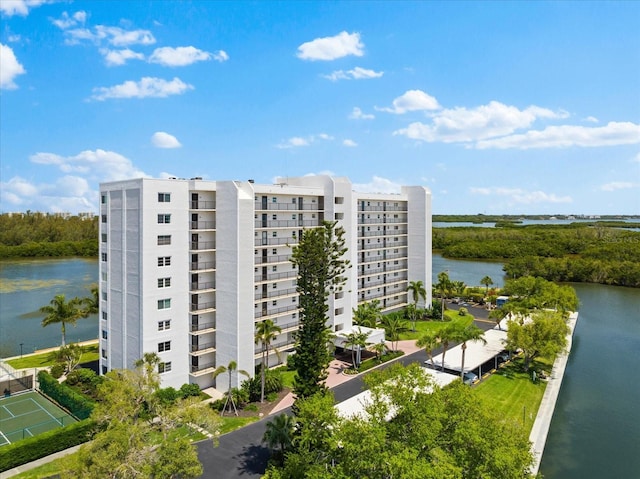 view of building exterior featuring a water view