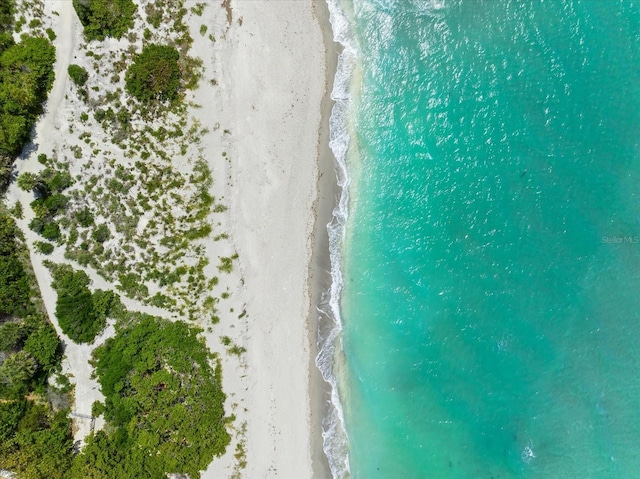 aerial view featuring a water view and a view of the beach