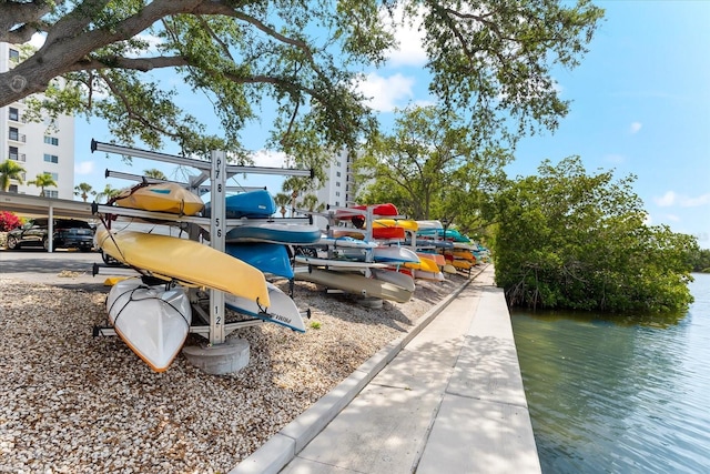 exterior space with a water view