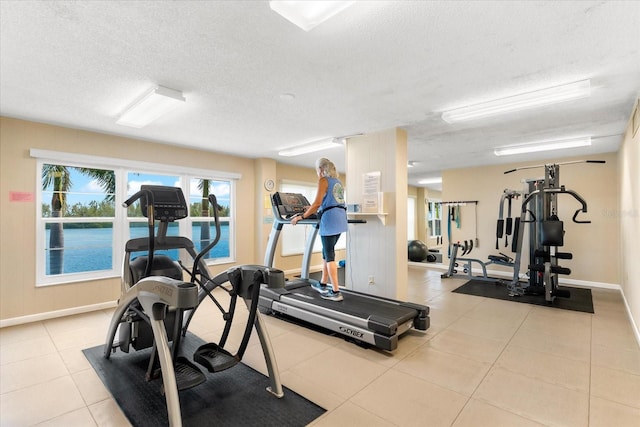 exercise area with a textured ceiling