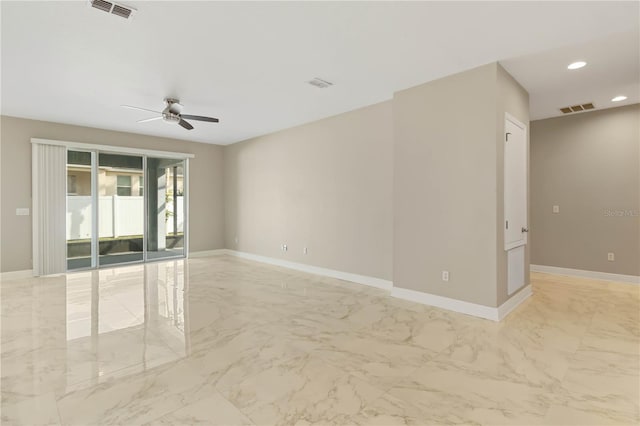 empty room featuring ceiling fan