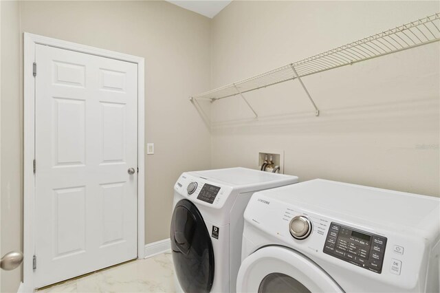 laundry area featuring separate washer and dryer