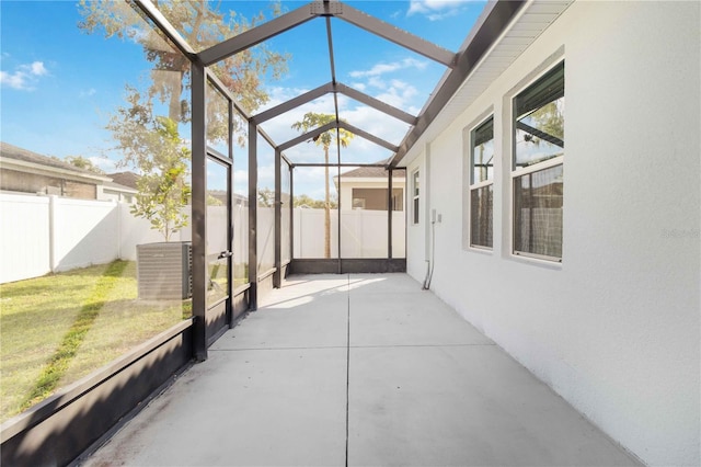 view of patio / terrace featuring a lanai