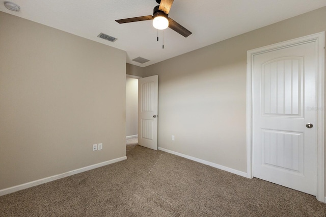 unfurnished bedroom with ceiling fan and carpet flooring