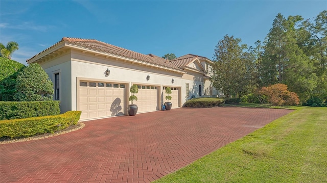 view of side of home with a garage