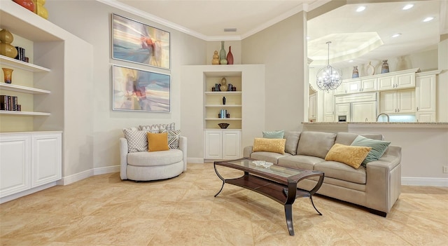 interior space featuring built in shelves, a chandelier, and ornamental molding