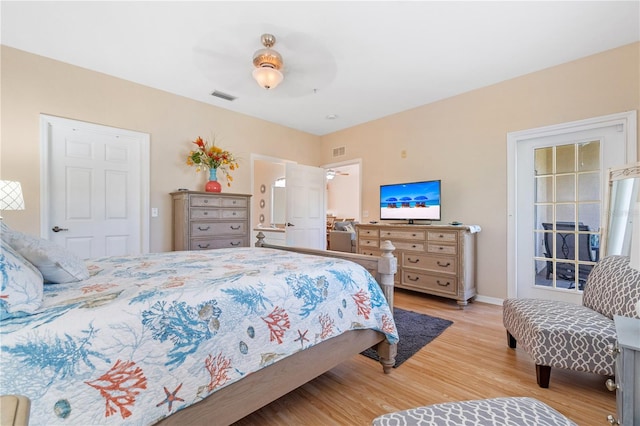 bedroom featuring ceiling fan and light wood-type flooring