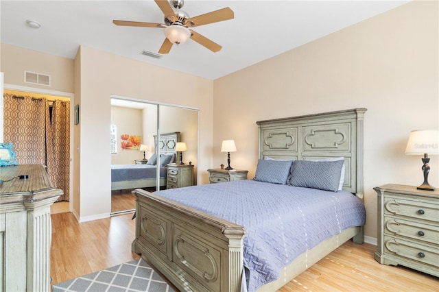 bedroom featuring a closet, ceiling fan, and light hardwood / wood-style floors