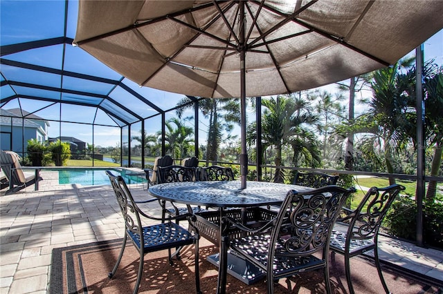 view of patio with glass enclosure