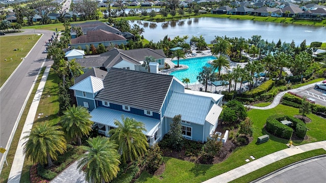 birds eye view of property featuring a water view