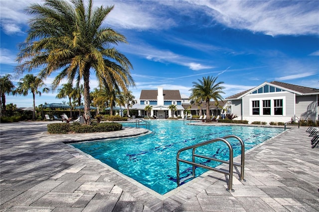 view of swimming pool with a patio area