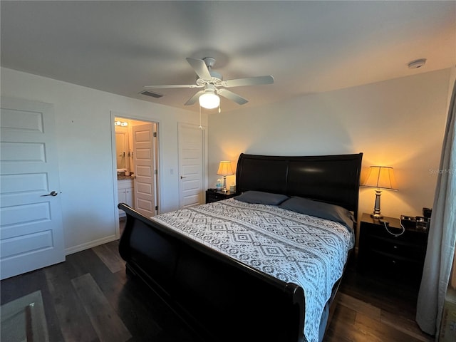 bedroom featuring connected bathroom, ceiling fan, and dark wood-type flooring