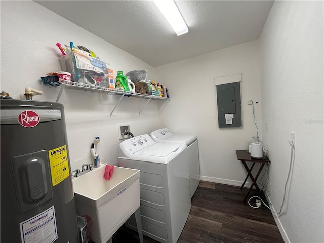 laundry room with sink, washing machine and dryer, electric water heater, dark hardwood / wood-style floors, and electric panel