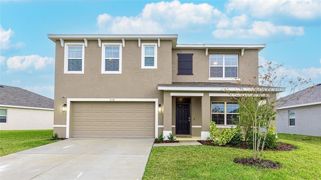 view of front of home with a garage and a front yard