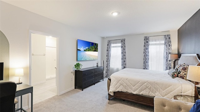 bedroom featuring light colored carpet