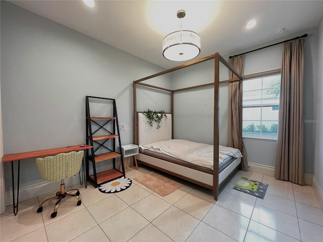 bedroom featuring light tile patterned floors