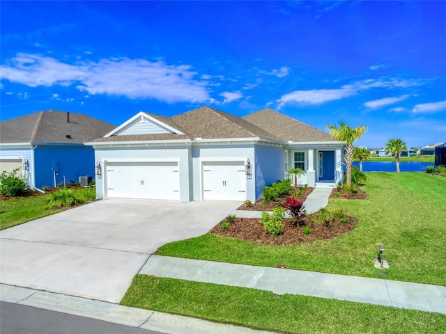 ranch-style home with an attached garage, a shingled roof, concrete driveway, stucco siding, and a front yard