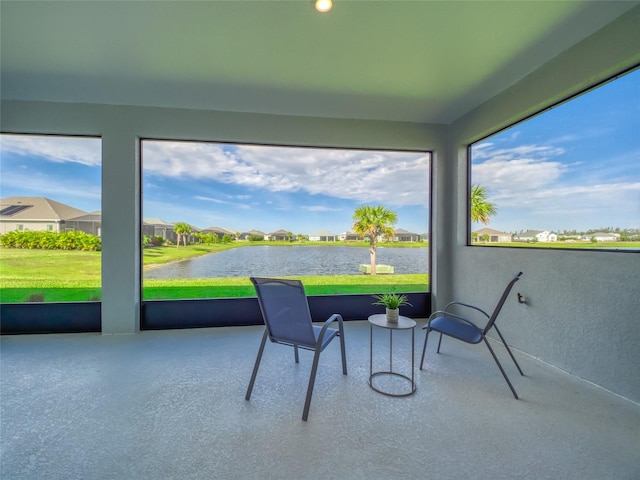 sunroom with a water view