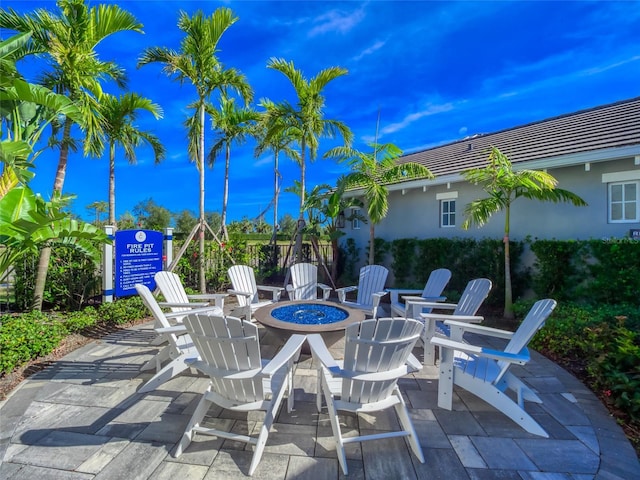 view of patio / terrace featuring a fire pit