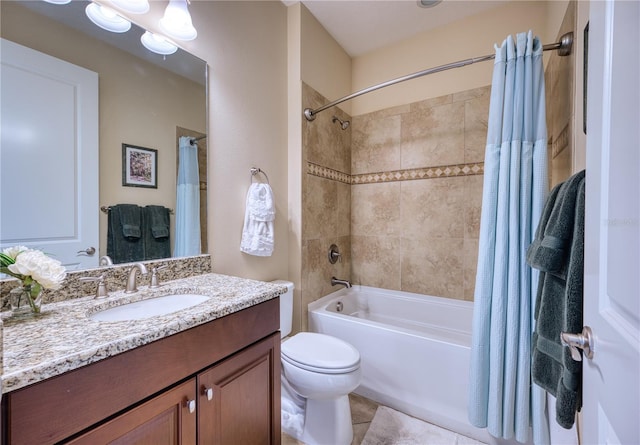 full bathroom with shower / bath combination with curtain, vanity, toilet, and tile patterned floors