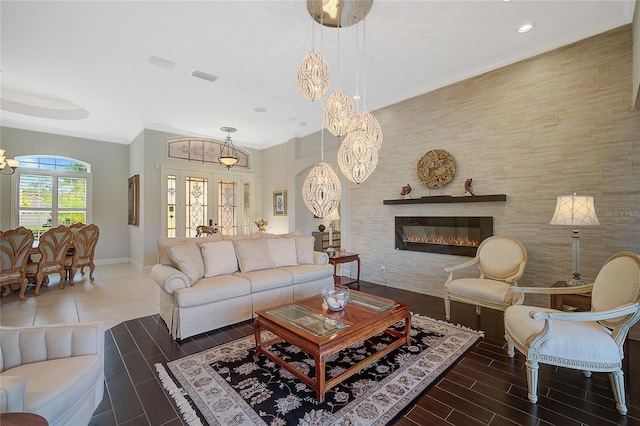 living room with french doors and crown molding