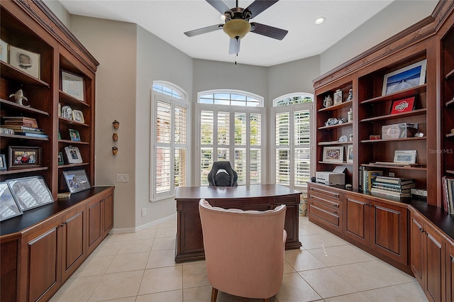 office featuring ceiling fan and light tile patterned flooring