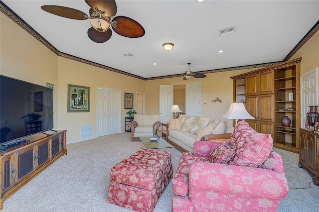 carpeted living room with crown molding