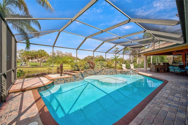 view of pool with a lanai and a patio