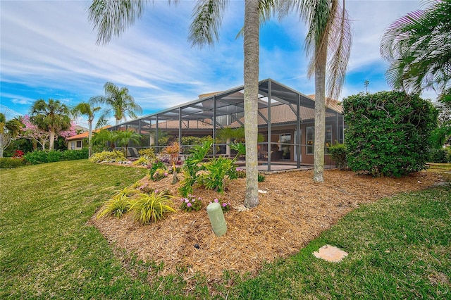 view of yard featuring a lanai