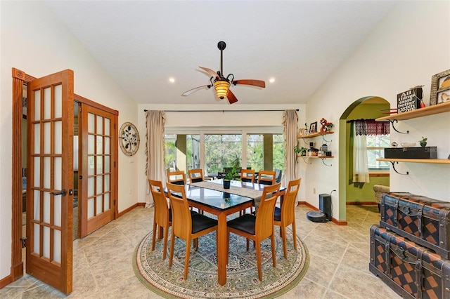 dining area featuring plenty of natural light, ceiling fan, french doors, and lofted ceiling