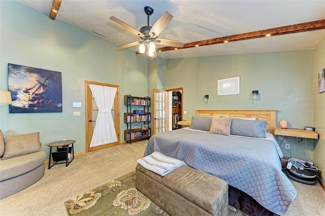 carpeted bedroom featuring vaulted ceiling with beams and ceiling fan