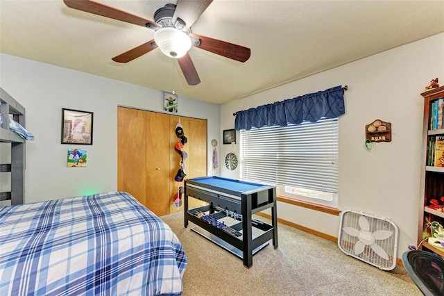 bedroom featuring carpet floors, billiards, a closet, and ceiling fan