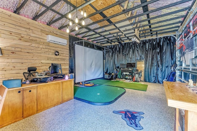 playroom featuring an AC wall unit and wooden walls