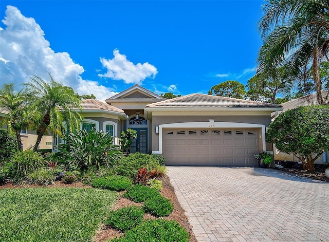 view of front of home with a garage