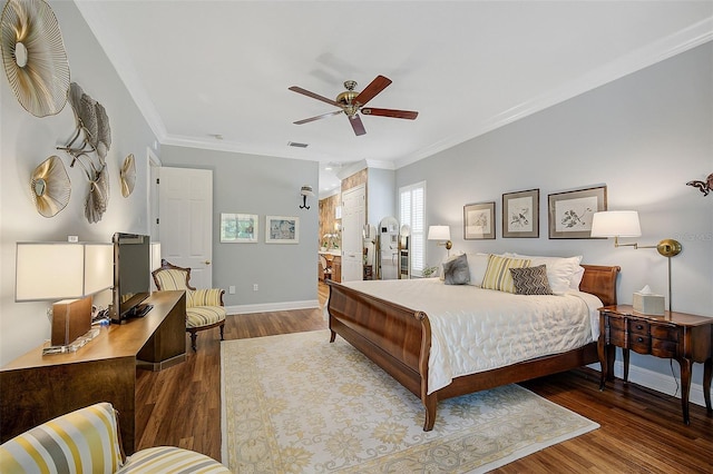 bedroom with ceiling fan, dark hardwood / wood-style floors, and ornamental molding