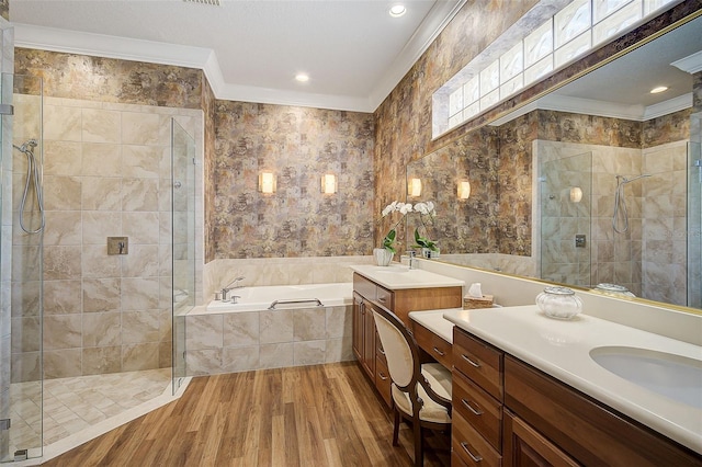 bathroom featuring vanity, separate shower and tub, ornamental molding, and tile walls