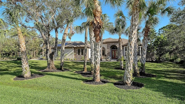 exterior space featuring a front yard