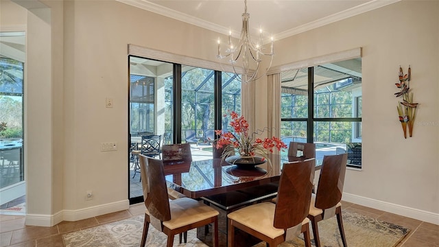 dining space featuring crown molding, tile patterned flooring, and a notable chandelier