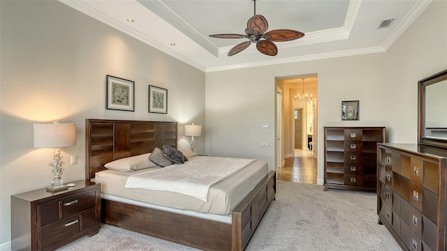 bedroom with light carpet, ceiling fan with notable chandelier, a raised ceiling, and ornamental molding