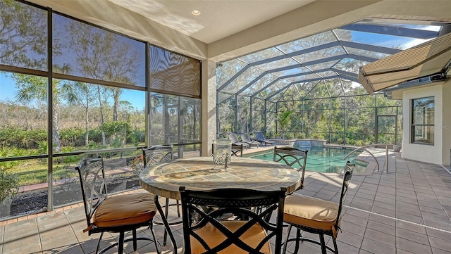 sunroom / solarium featuring a pool