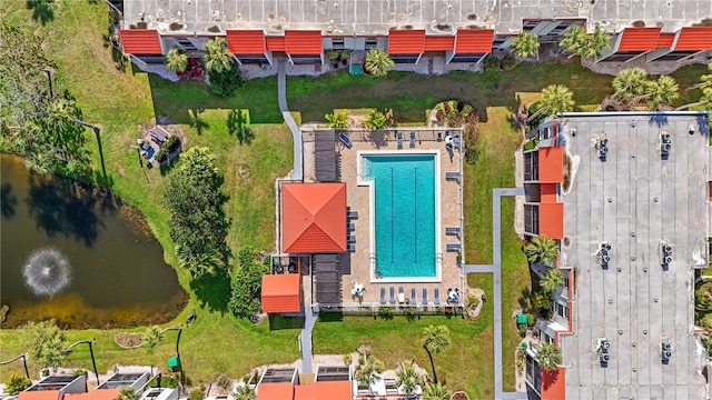 birds eye view of property featuring a water view