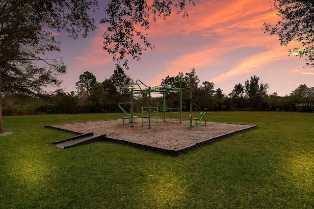 playground at dusk with a yard